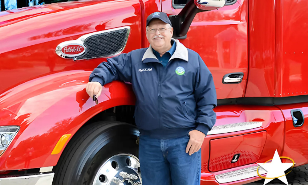 Man sitting calmly at truck, focused on mental well-being.
